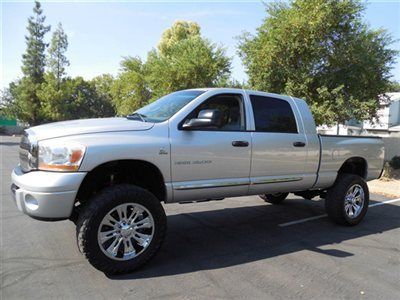 Leather loaded 5.9 megacab and its lifted dvd s in headrest,this truck is sweet