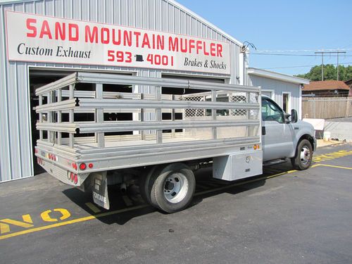 2006 ford f-350 dually, aluminum flat bed w/ matching side boards"low reserve"