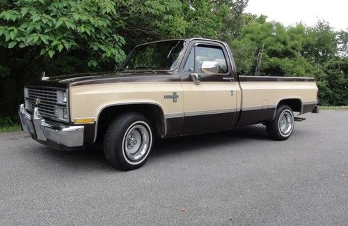 Original and excellent condition with low miles. longbed two toned brown / beige