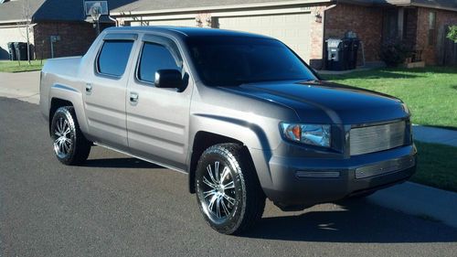 Ridgeline 4x4 oversized tires and custom wheels, grille, &amp; lights low miles