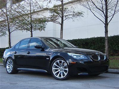 2008 bmw m5 black sapphire-brown with 21k mls.