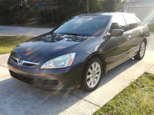 Honda accord ex v6 fully loaded in excellent condition, looks and runs like new.