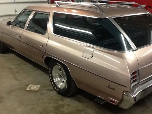 1973 impala station wagon. 454 engine, 3 seater, rust free, clamshell, caprice