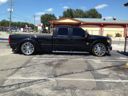 2012 ford f350 dually lowered on 26s balck metallic with black leather