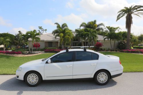 2007 white volkswagen passat b6 2.0t 4-door sedan, roof rack, bike rack