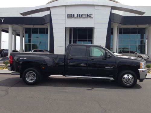 2000 miles! loaded ltz 4x4 dually cummings diesel close to new as you can get!!
