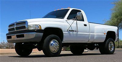 No reserve 99 dodge ram 3500 5 spd man 4x4 dually low low miles 1 az ownr clean