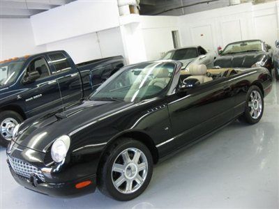 57,000 miles loaded florida car gorgeous black on ivory interior wow must see!