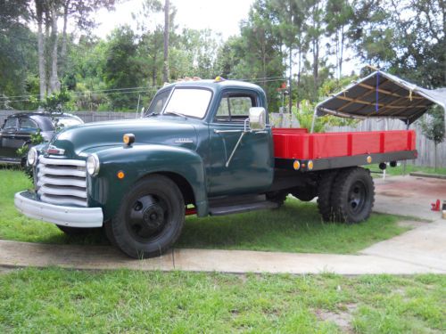 Green and red all steel body runs and drives 10 foot steel flat bed dump