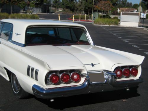 60 thunderbird, a real head turner, red interior, ready to cruise!