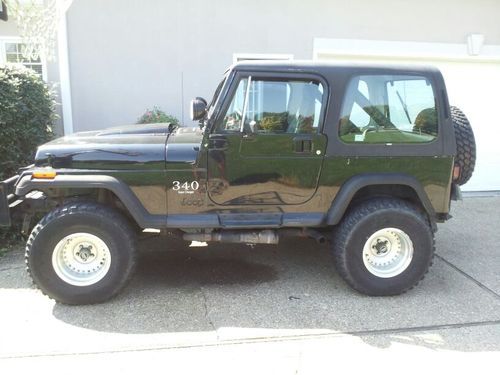 1988 "super modified" blk jeep wrangler with 4" susp. lift and supercharged v8
