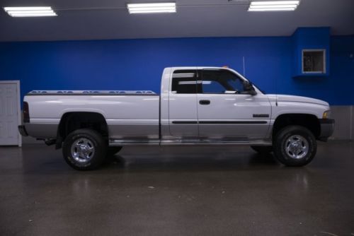 Low miles 5.9l cummins diesel manual running boards bed liner fifth wheel hitch
