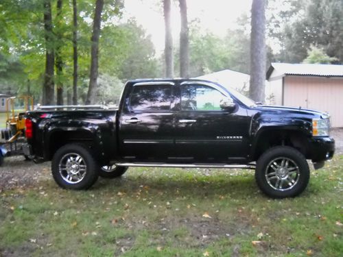 Black 2011 rocky ridge "outlaw" chevy silverado 1500