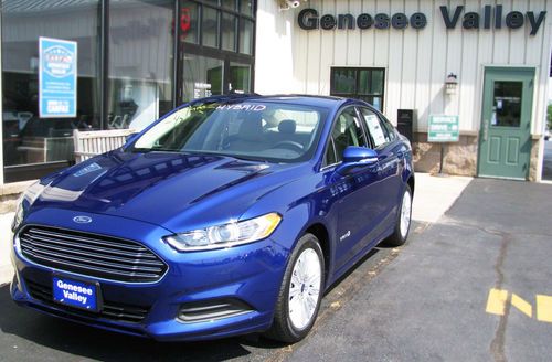 2013 ford fusion hyrbid - 47 mpg highway and city - deep impact blue