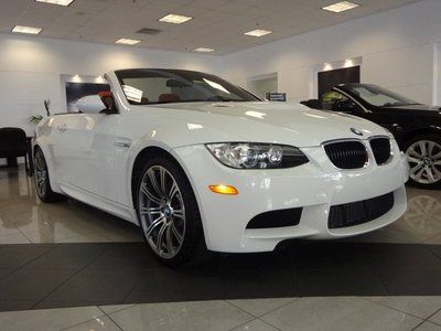 Bmw's m3 in rare alpine white/fox red novillo leather