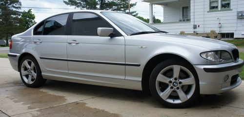 Silver 330xi, 5 speed manual, awd, tinted windows, awesome car!