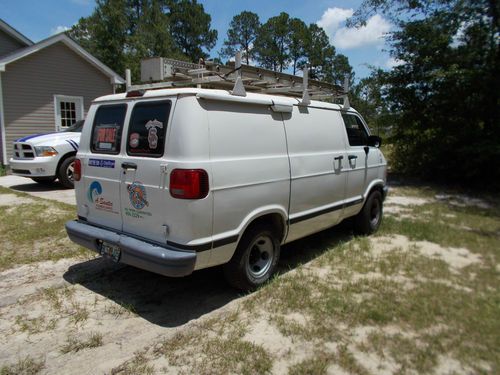 V-6 auto,new tires set up for service work.racks fullset up. 2 owner