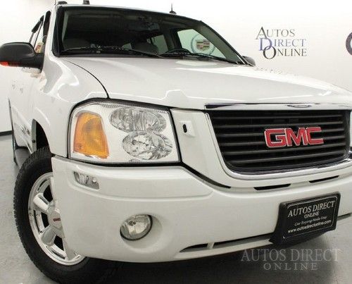 We finance 05 slt 4wd sunroof heated seats cd changer 3rd row tow hitch fogs