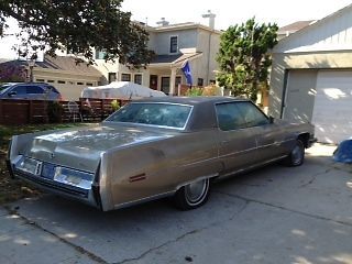 1973 cad-interior leather seats, body, and paint in very good shape.  ran good.
