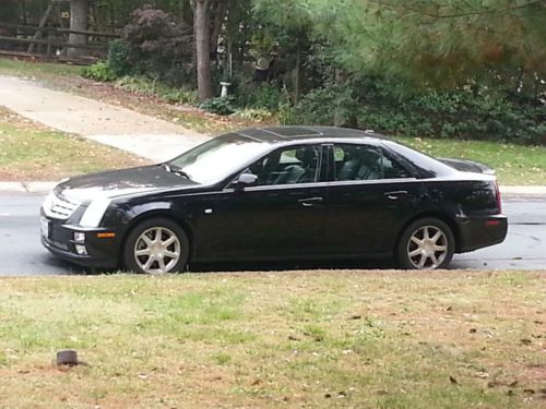 2005 cadillac sts sedan 4-door 4.6l black w/black leather interior, bose system