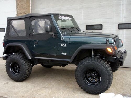 2005 jeep wrangler x  6cylinder, 6-speed, 6 inches of lift, new 35's,   monster!