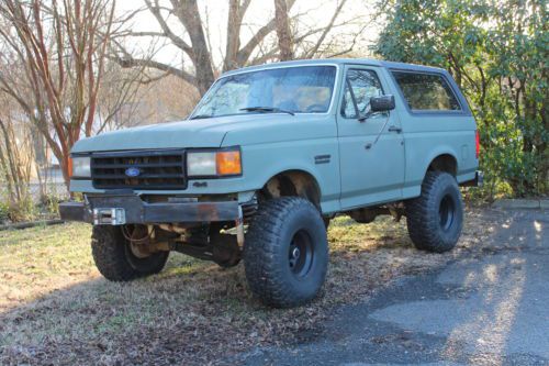 Lifted 1991 green ford bronco 4x4