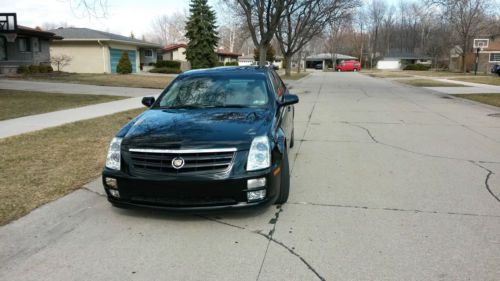 2005 cadillac sts base sedan 4-door 4.6l black with tan leather