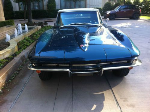 Beautiful laguna blue with white soft top