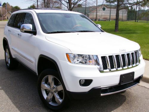 2013 jeep grand cherokee overland 4x4,5.7l hemi, panroof, nav, rebuilt, warranty