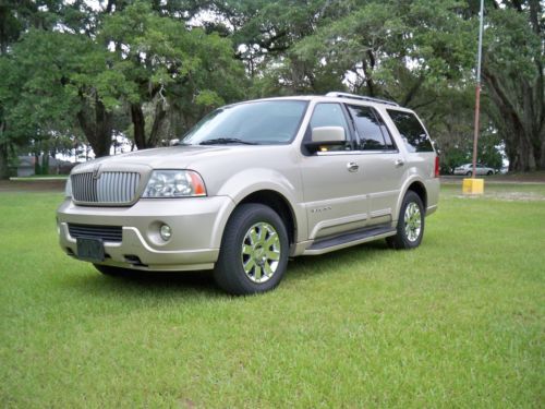 2004 lincoln navigator,highway miles,lthr,snrf,3rd seat,clean,last bid wins