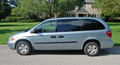 Sky blue dodge caravan se