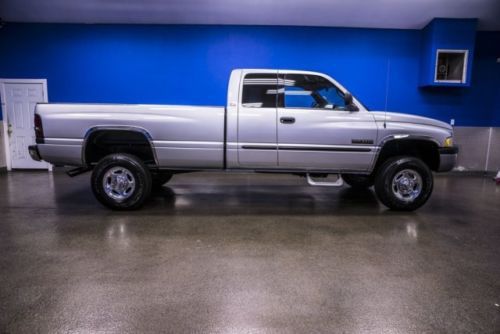 5.9l turbo cummins diesel extended cab automatic bed liner side steps tow pkg