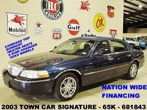 2003 town car signature regency edition,sunroof,htd lth,6 disk cd,65k,we finance