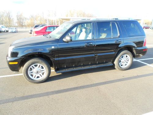 2003 mercury mountaineer premier,awd,3rd row seat,roof,leather,all power,nice!!