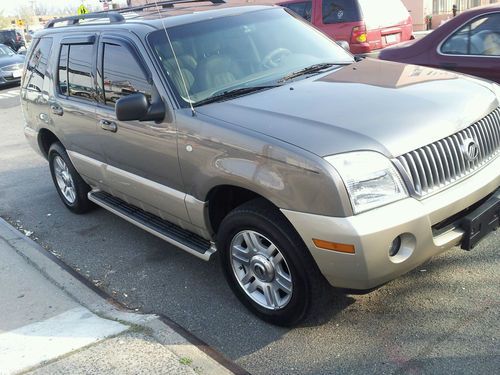 Mountaineer awd leather heated sunroof 6 disc 3rd row 17 inch alloys clean fax