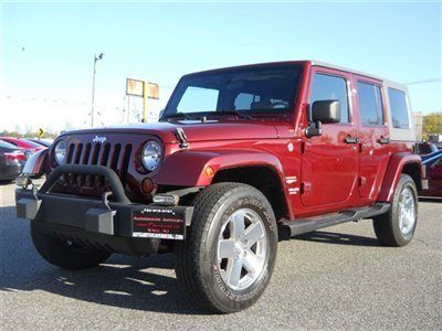 We finance! 4x4 auto a/c navigation leather hard and soft tops 1owner off lease!