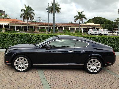 Gt coupe - ultra low miles - mulliner wheels - dark sapphire on saffron - awd