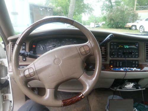 Pearl white buick park avenue