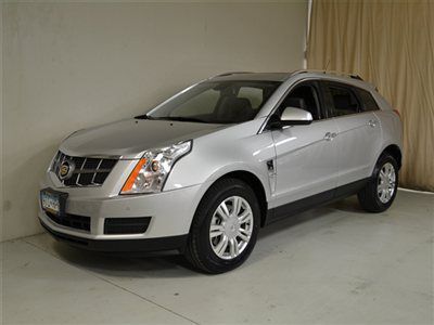 2011 cadillac srx. luxury collection. silver color, with gray leather interior.