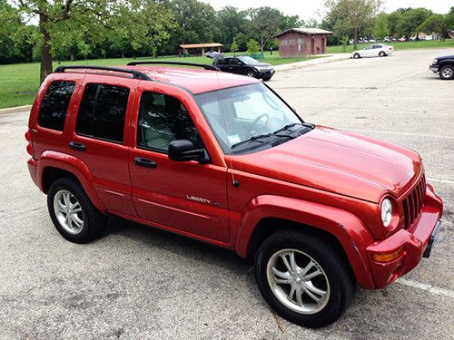 4wd with upgrades pearl red 3.7l v6