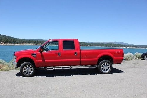 92,000 miles, 5k on new balanced 6.4 litre diesel, 4x4, 8' bed, crewcab, srw