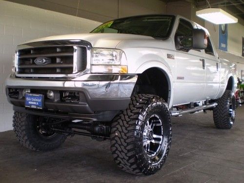 2004 ford f250 crew 4wd 6.0l diesel 8 inch lift 38 inch tires 59k rust free