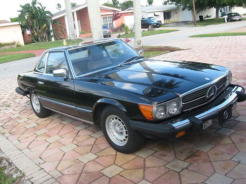 Black convertible mint mercedes 380sl leather interiors automatic,alloy wheels.