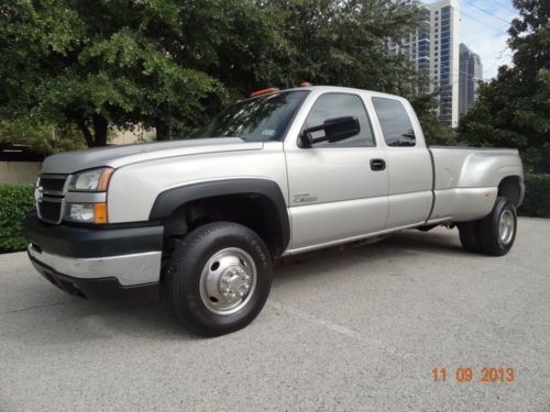 06 chevy silerado 3500 ls ext.cab 4x4 auto tx clean runs great no problems 3 own