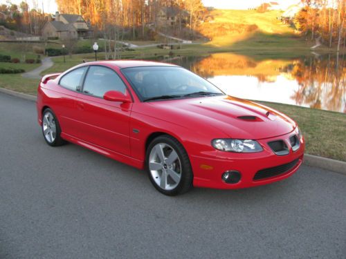 2005 pontiac gto red/black, 6-sp manual, 13k miles, showroom new