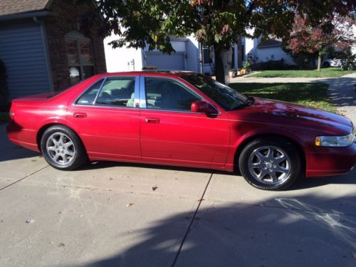 2002 seville sts pearl red all options 44 k actual miles a must see low $$ deal!