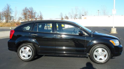 Clean in and out! sporty interior! check out this beautiful dodge caliber sxt!!