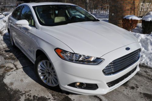 2013 fusion hybrid.no reserve.leather/navi/moon/camera/sensors/blis/clear title!