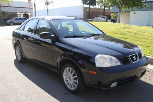 2004 suzuki forenza lx sedan automatic 4 cylinder no reserve