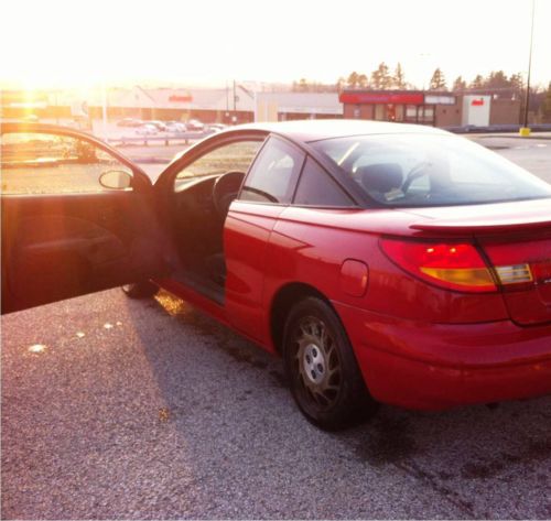 Saturn sc2 2000 red 5-speed super mpg